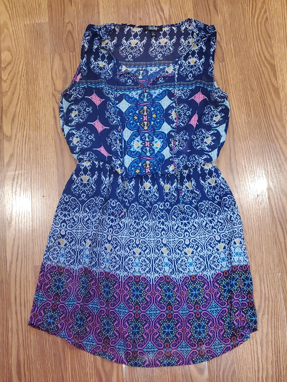 Sleeveless Blue Printed Dress With Cinched In Waist